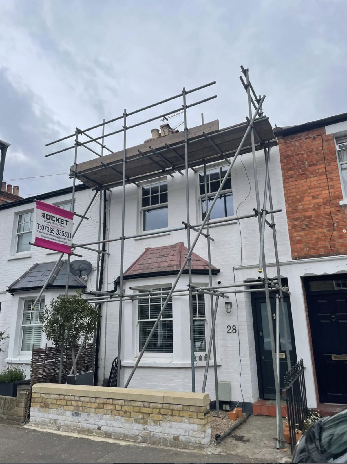 Residential property fully scaffolded for roofing works, London — Rocket Scaffolding